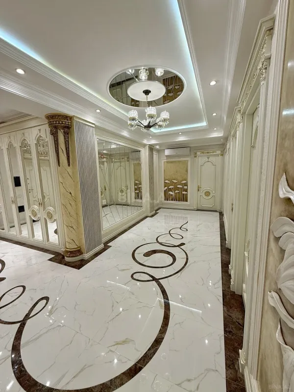 Satılır 4 otaqlı mənzil 165 m²