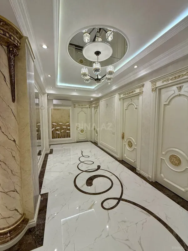 Satılır 4 otaqlı mənzil 165 m²