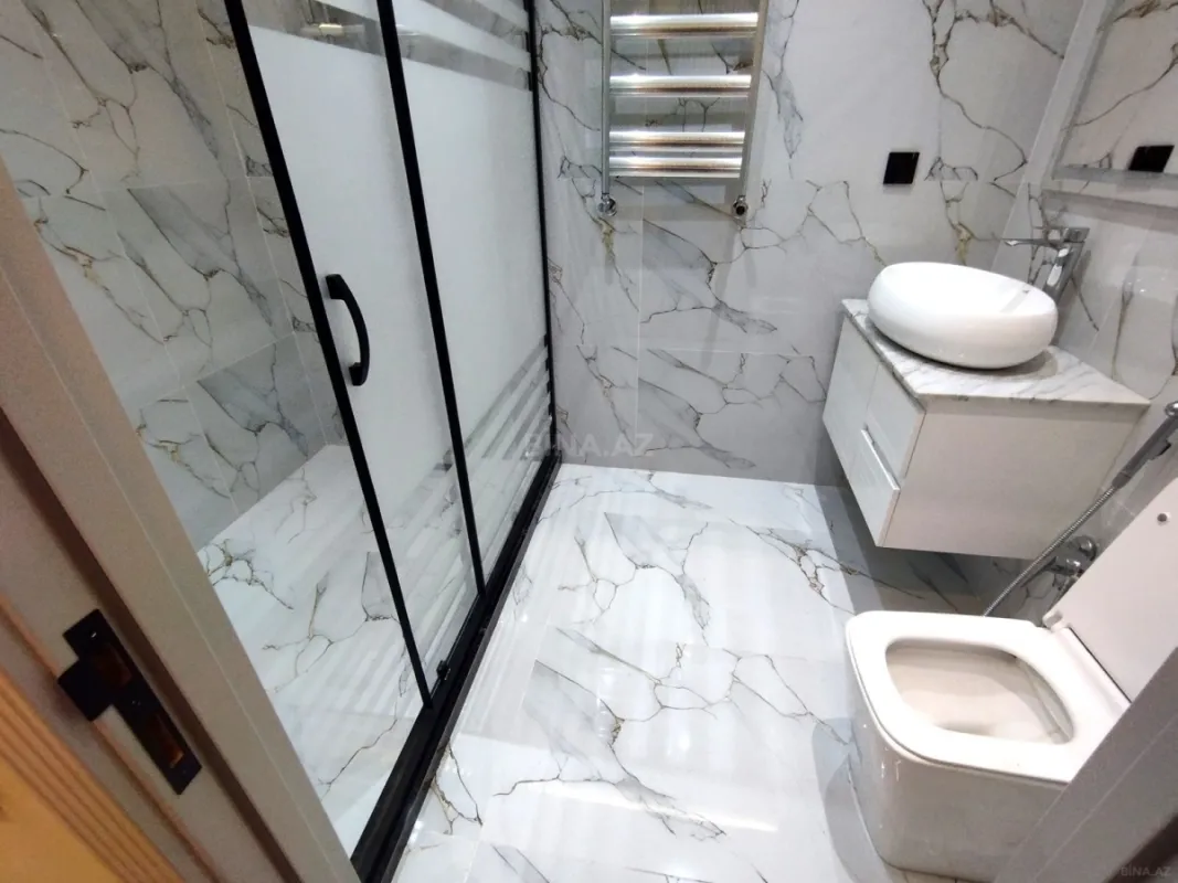 Satılır 4 otaqlı mənzil 133 m²