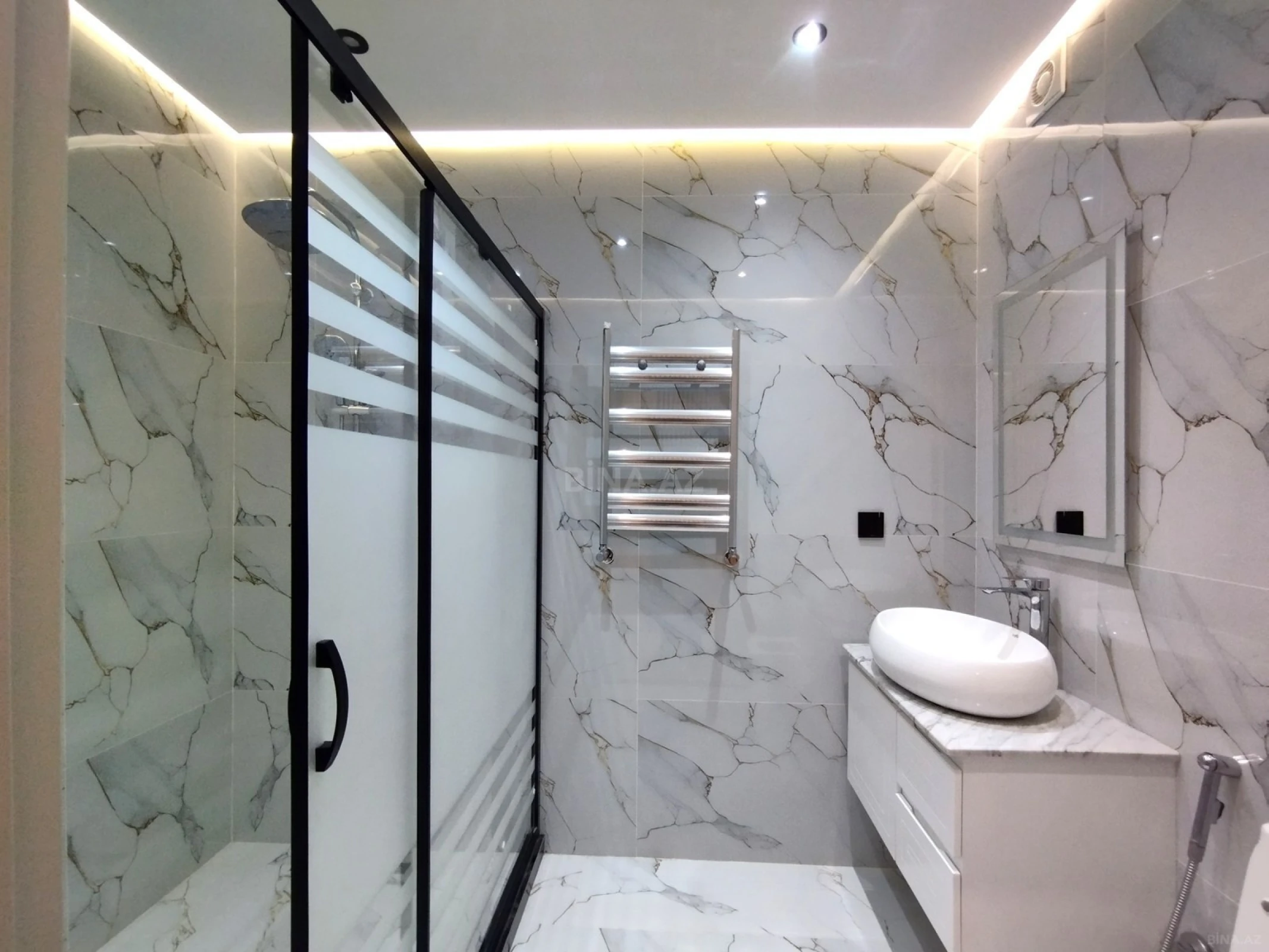 Satılır 4 otaqlı mənzil 133 m²