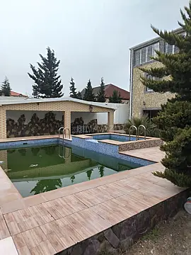 Satılır 12 otaqlı həyət evi 404 m²