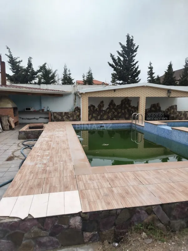 Satılır 12 otaqlı həyət evi 404 m²