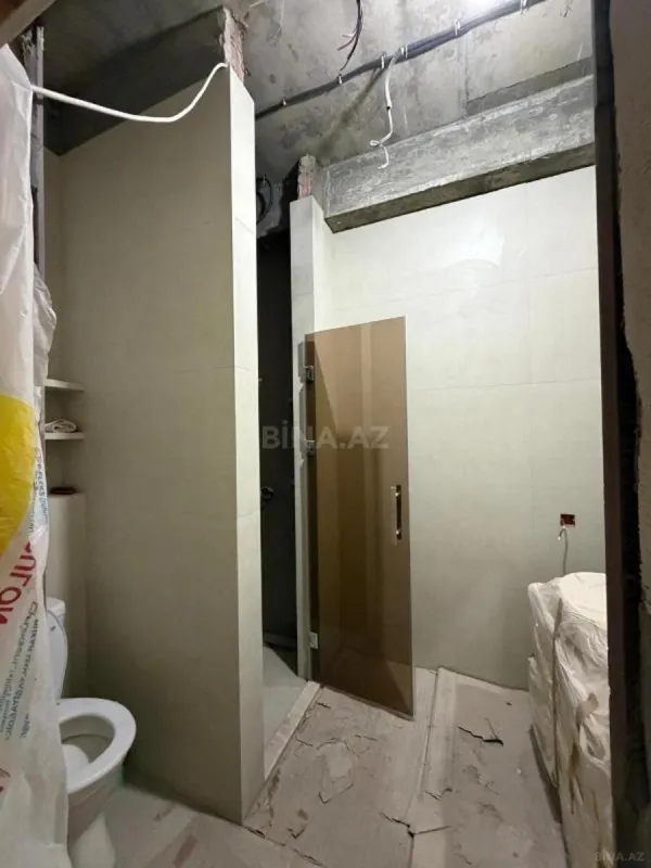 Satılır 4 otaqlı mənzil 147 m²