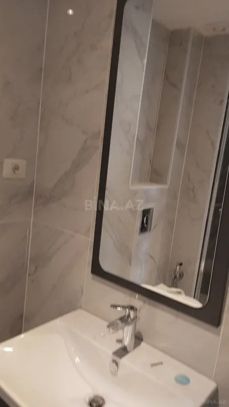 Satılır 4 otaqlı mənzil 103 m²