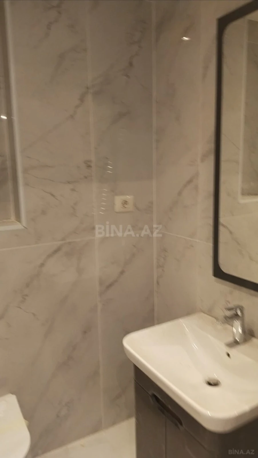 Satılır 4 otaqlı mənzil 103 m²
