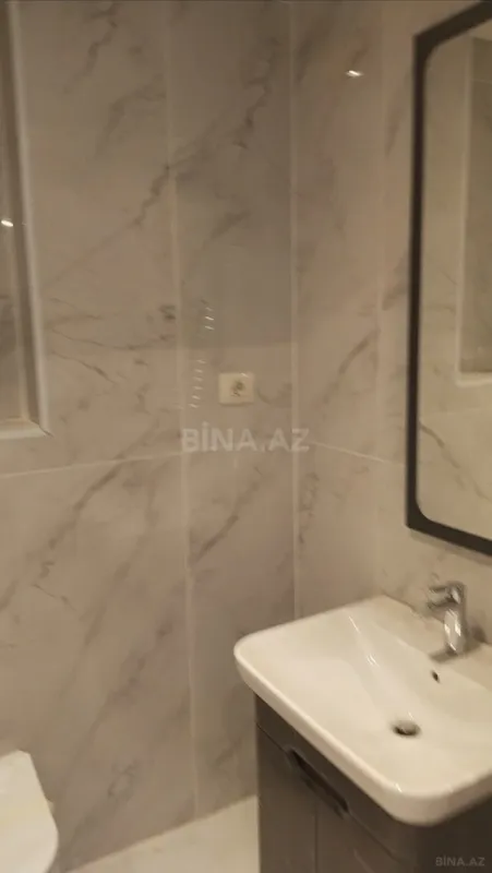 Satılır 4 otaqlı mənzil 103 m²