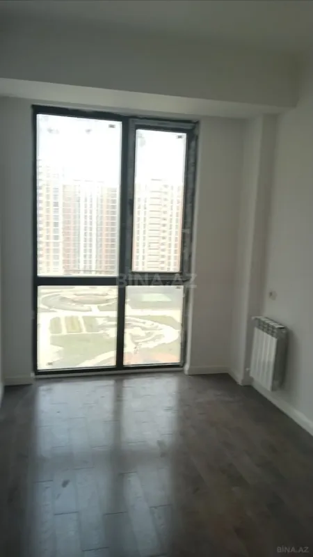 Satılır 4 otaqlı mənzil 103 m²