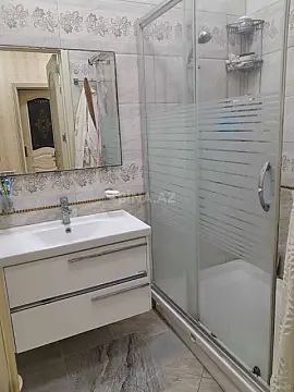 Satılır 3 otaqlı mənzil 132 m²