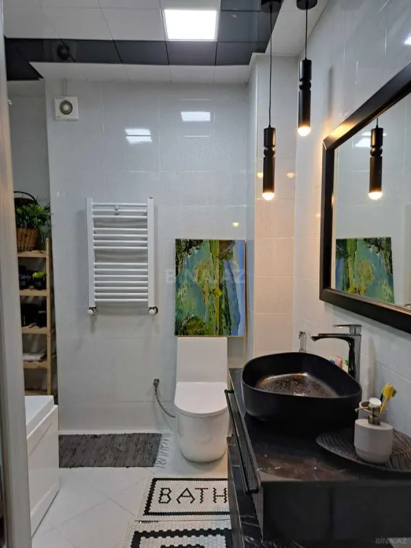 Satılır 4 otaqlı mənzil 107 m²