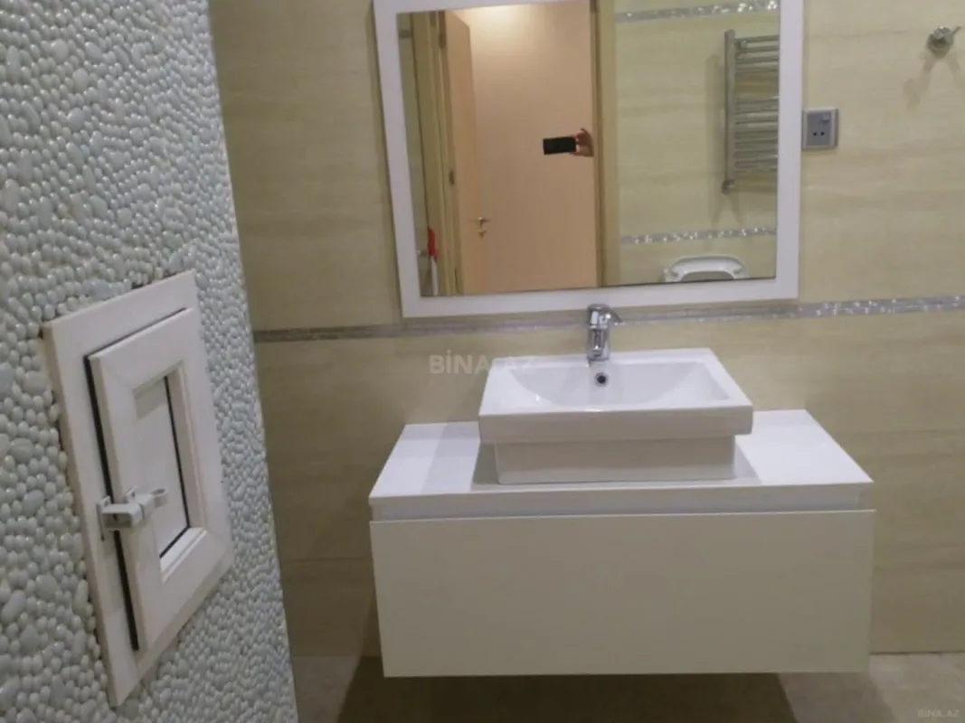 Satılır 4 otaqlı mənzil 220 m²