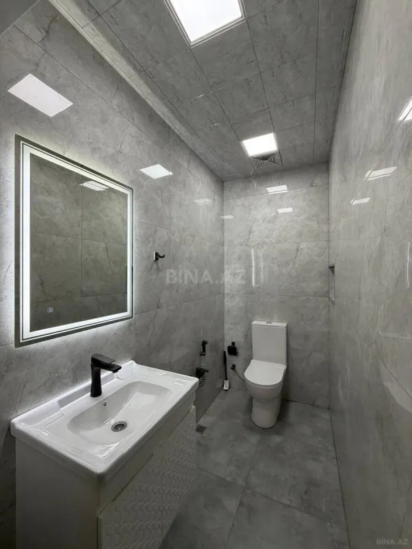 Satılır 4 otaqlı mənzil 155 m²