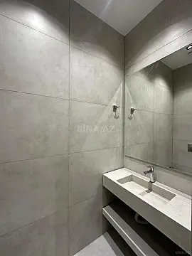 Satılır 3 otaqlı mənzil 139.9 m²