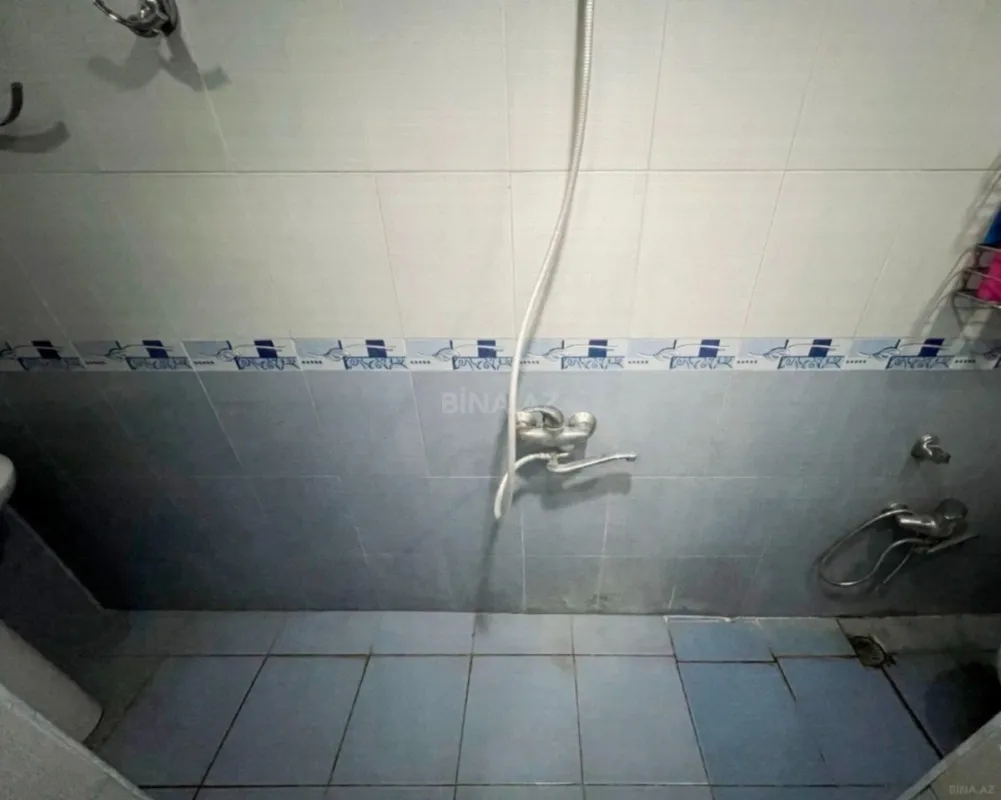 Satılır 9 otaqlı mənzil 210 m²