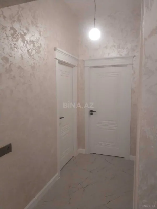 Satılır 3 otaqlı mənzil 119 m²