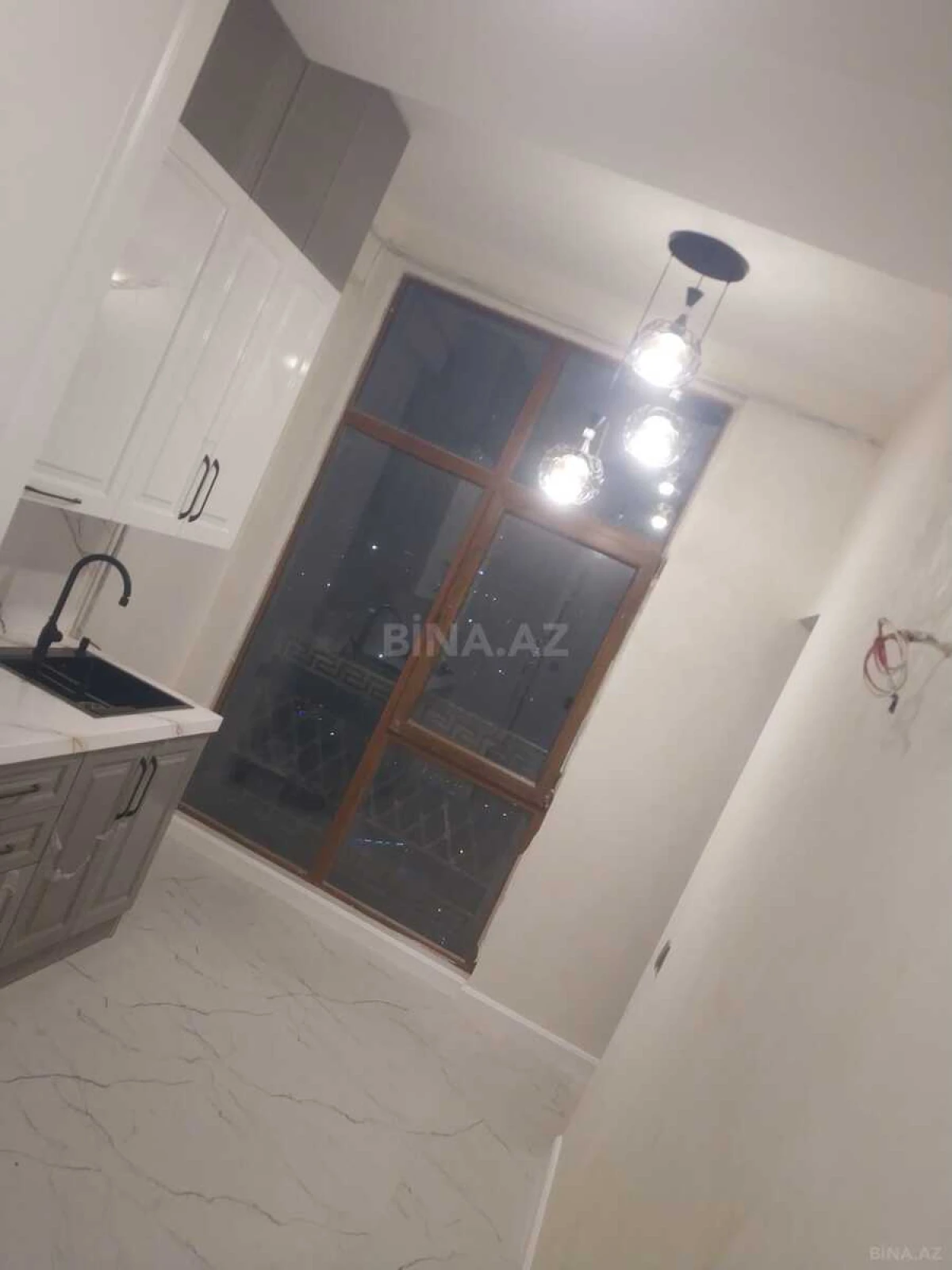 Satılır 3 otaqlı mənzil 119 m²