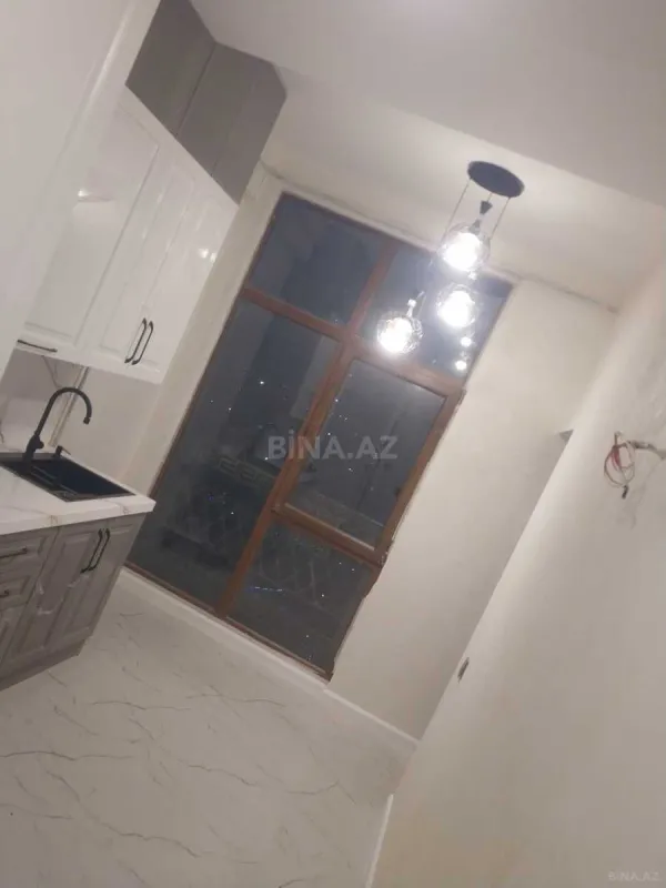 Satılır 3 otaqlı mənzil 119 m²