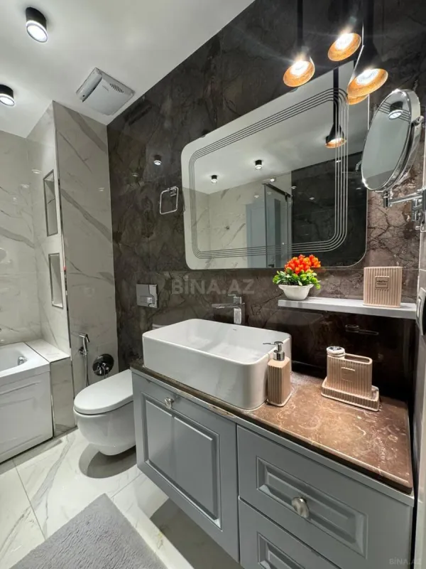 Satılır 3 otaqlı mənzil 127 m²