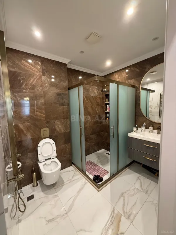 Satılır 4 otaqlı mənzil 180 m²