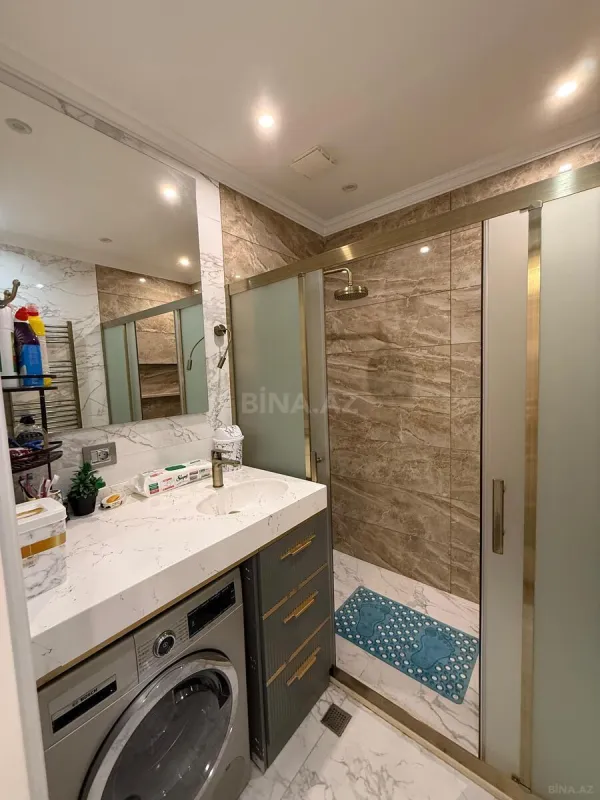 Satılır 4 otaqlı mənzil 180 m²