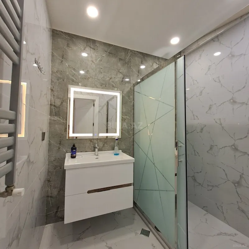 Satılır 2 otaqlı mənzil 103 m²
