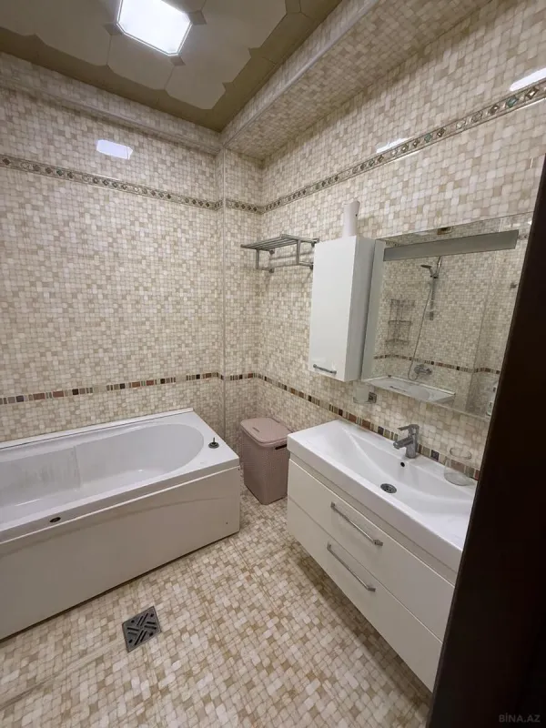 Satılır 4 otaqlı mənzil 169 m²