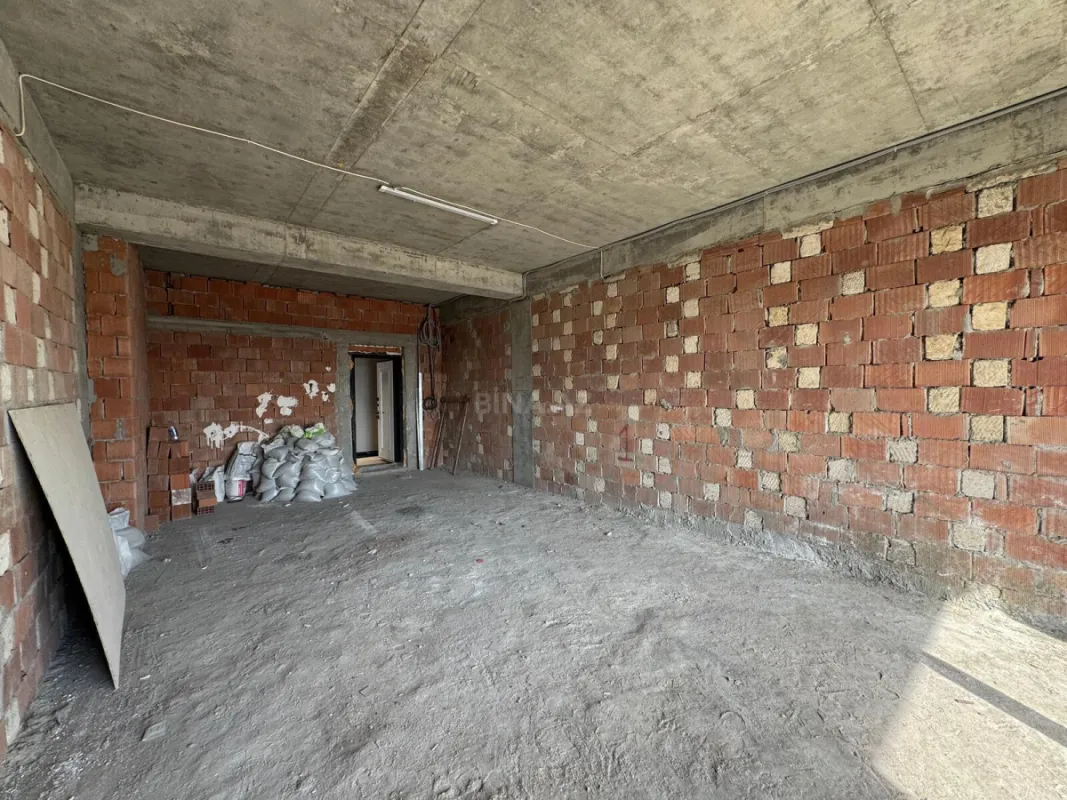 Satılır 1 otaqlı mənzil 57.4 m²