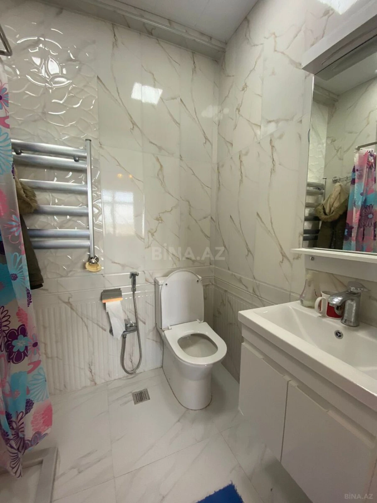 Satılır 3 otaqlı mənzil 141.4 m²