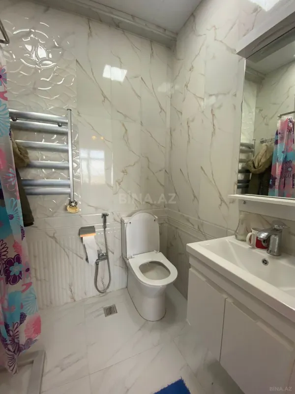 Satılır 3 otaqlı mənzil 141.4 m²