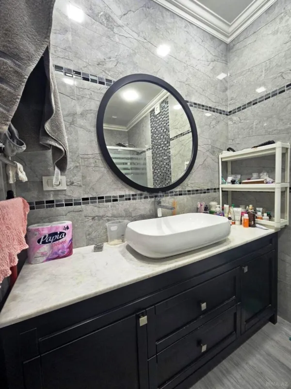 Satılır 3 otaqlı mənzil 141 m²