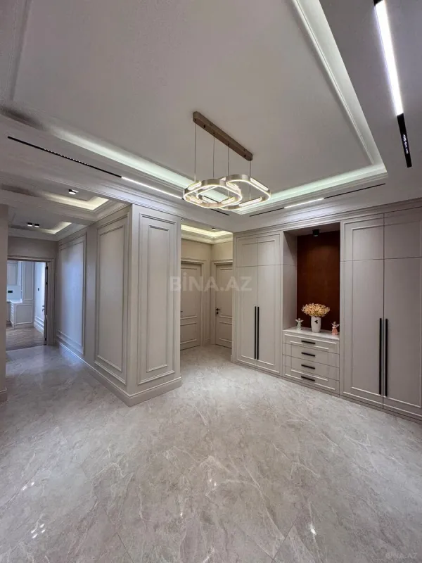 Satılır 4 otaqlı mənzil 165 m²