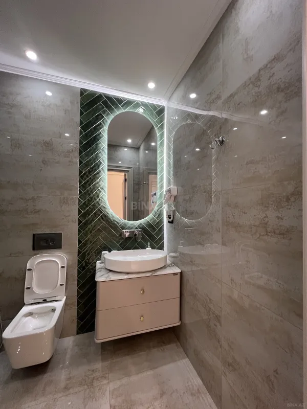 Satılır 4 otaqlı mənzil 165 m²