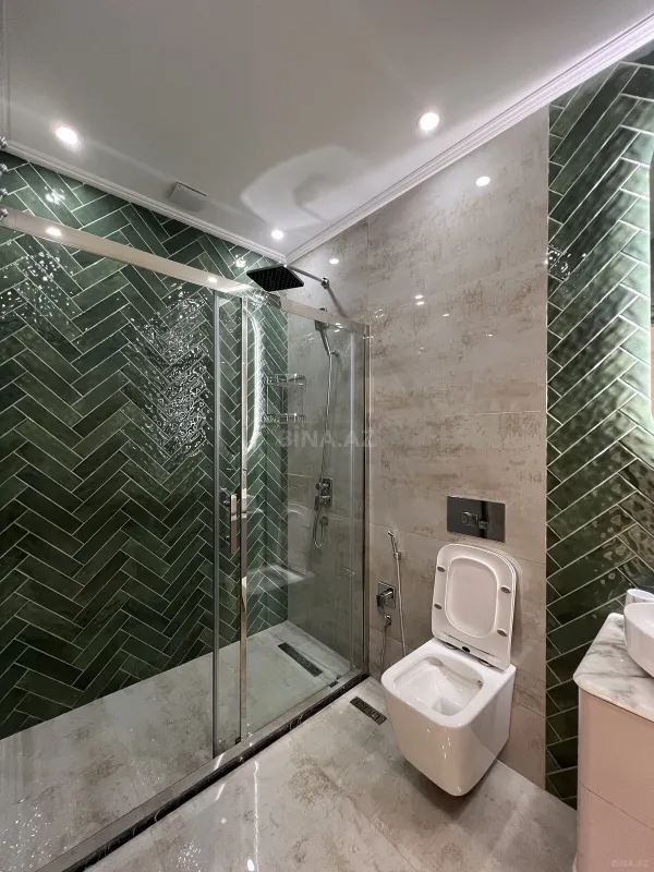 Satılır 4 otaqlı mənzil 165 m²