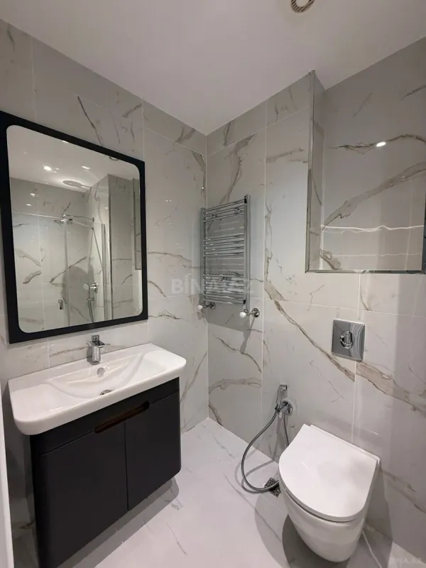 Satılır 4 otaqlı mənzil 105 m²