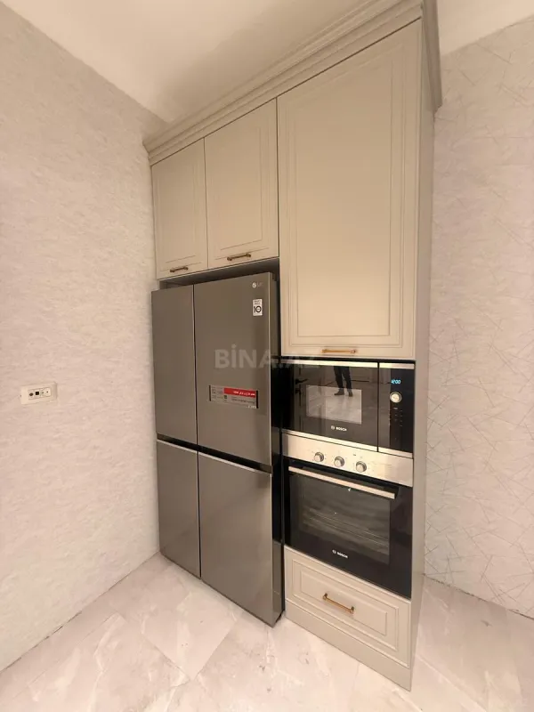 Satılır 4 otaqlı mənzil 142 m²