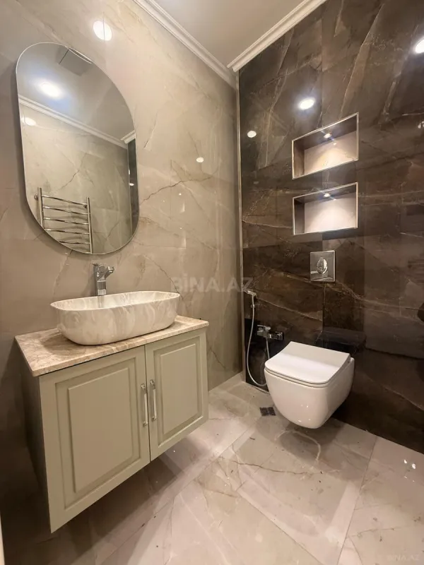 Satılır 4 otaqlı mənzil 142 m²