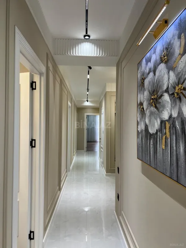 Satılır 4 otaqlı mənzil 140 m²