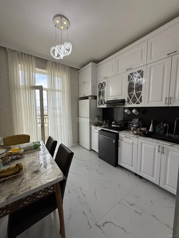 Satılır 4 otaqlı mənzil 117 m²