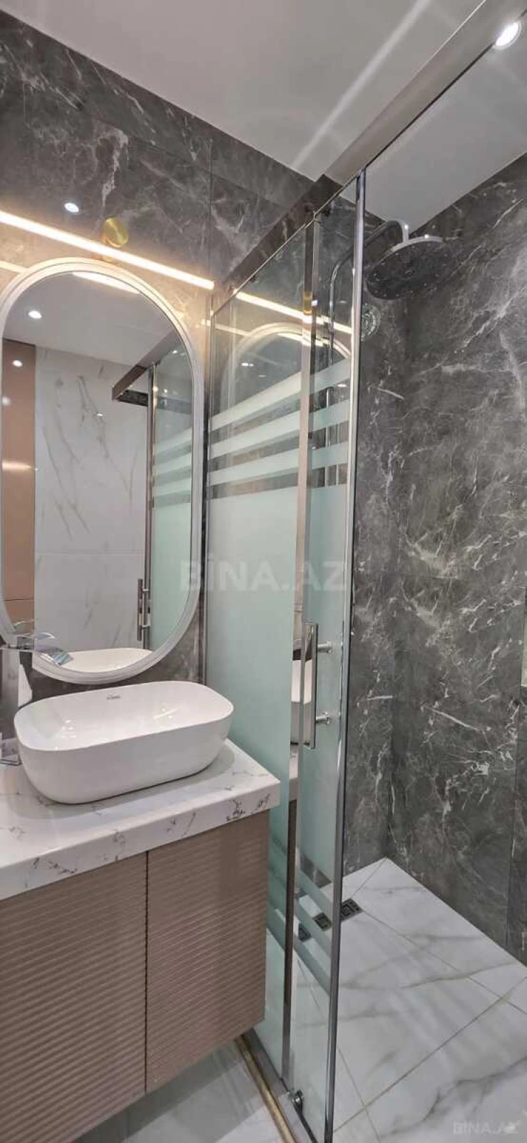 Satılır 4 otaqlı mənzil 155 m²