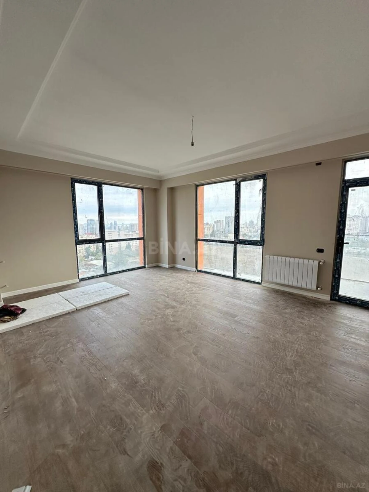 Satılır 4 otaqlı mənzil 123.6 m²