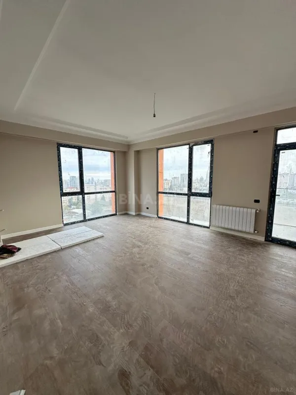 Satılır 4 otaqlı mənzil 123.6 m²