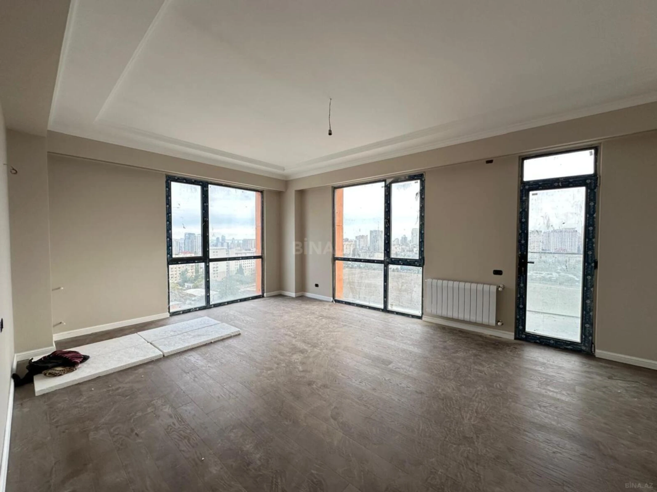 Satılır 4 otaqlı mənzil 123.6 m²