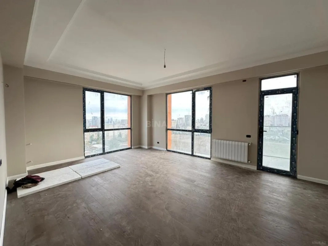 Satılır 4 otaqlı mənzil 123.6 m²