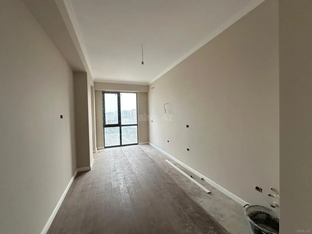 Satılır 4 otaqlı mənzil 123.6 m²