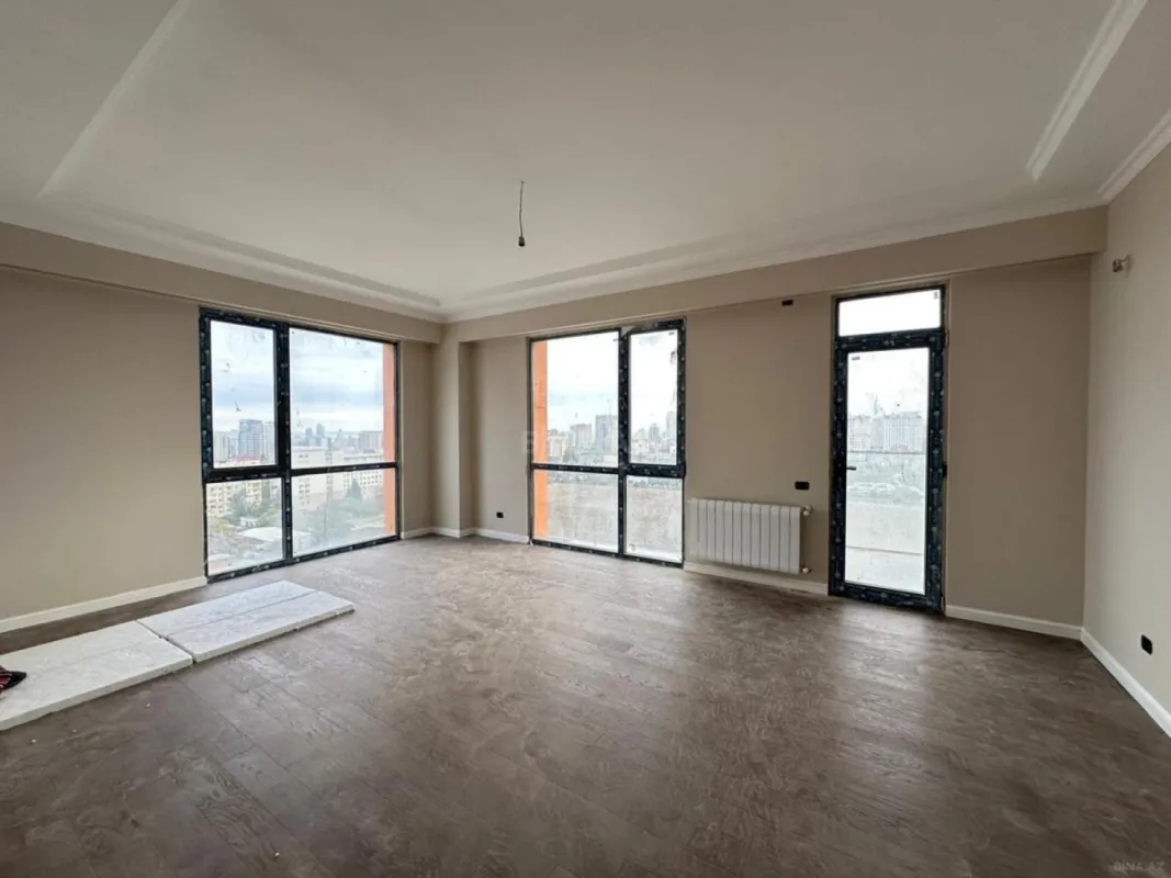 Satılır 4 otaqlı mənzil 123.6 m²