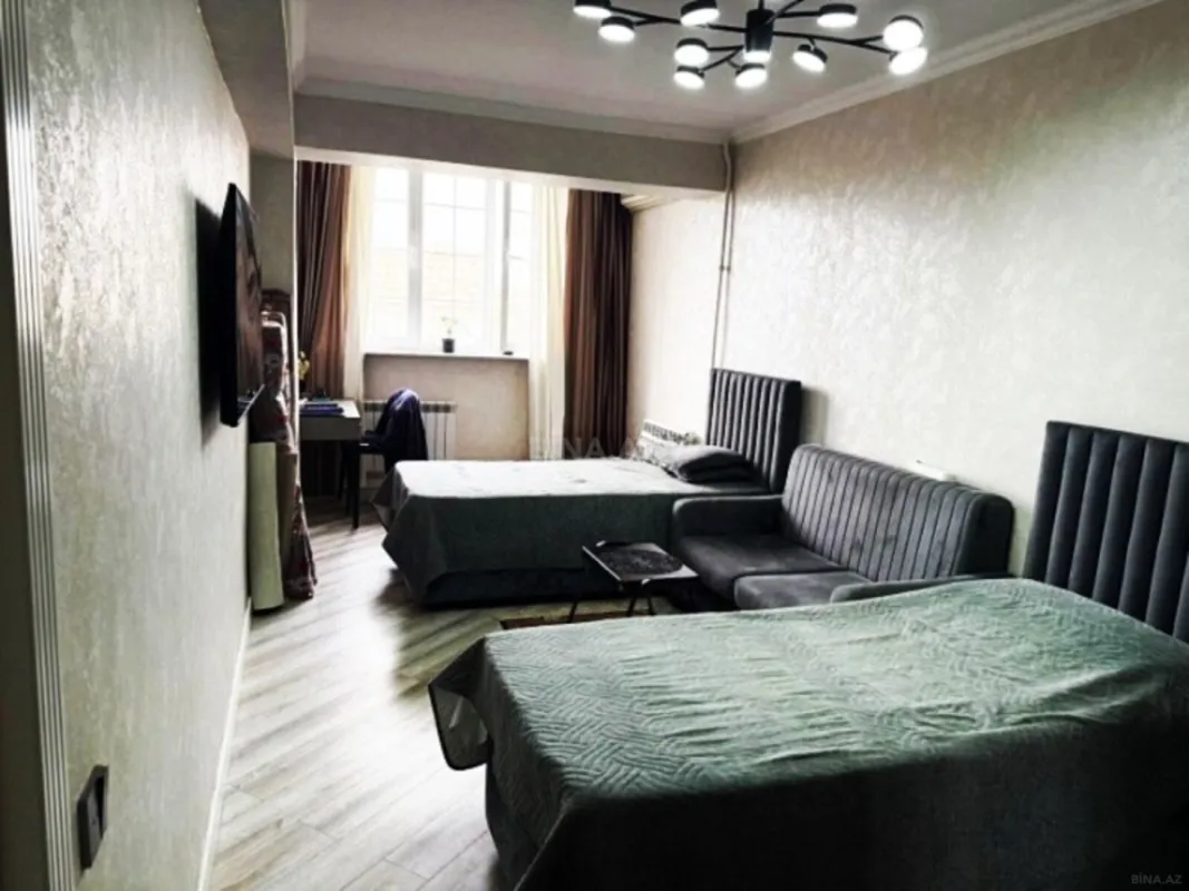 Satılır 4 otaqlı mənzil 145 m²