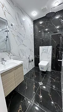 Satılır 4 otaqlı mənzil 138 m²