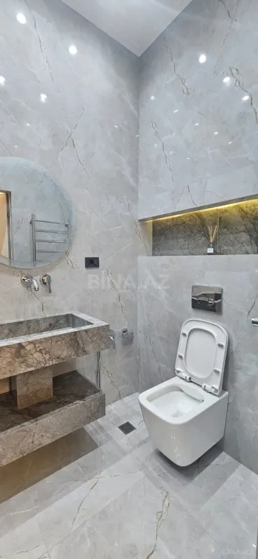 Satılır 3 otaqlı mənzil 122 m²