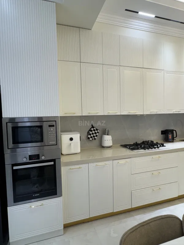Satılır 4 otaqlı mənzil 124 m²