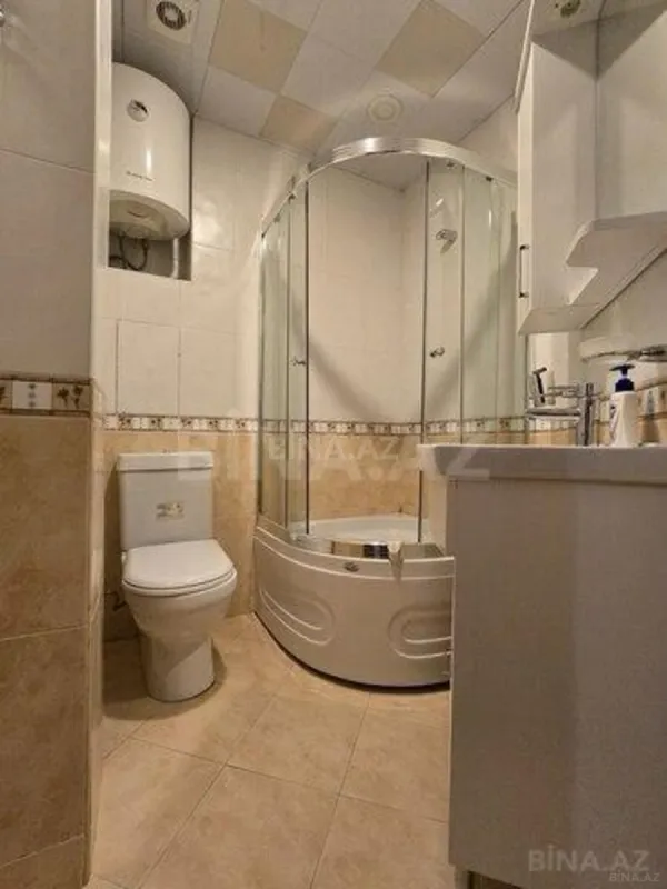 Satılır 4 otaqlı mənzil 165 m²