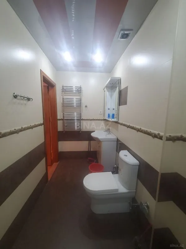 Satılır 4 otaqlı mənzil 164 m²